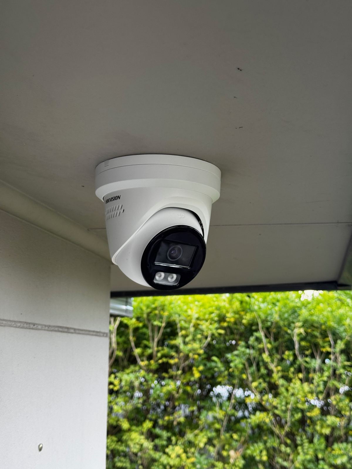 Hikvision security camera installed under an eave by Expert Electrical Services