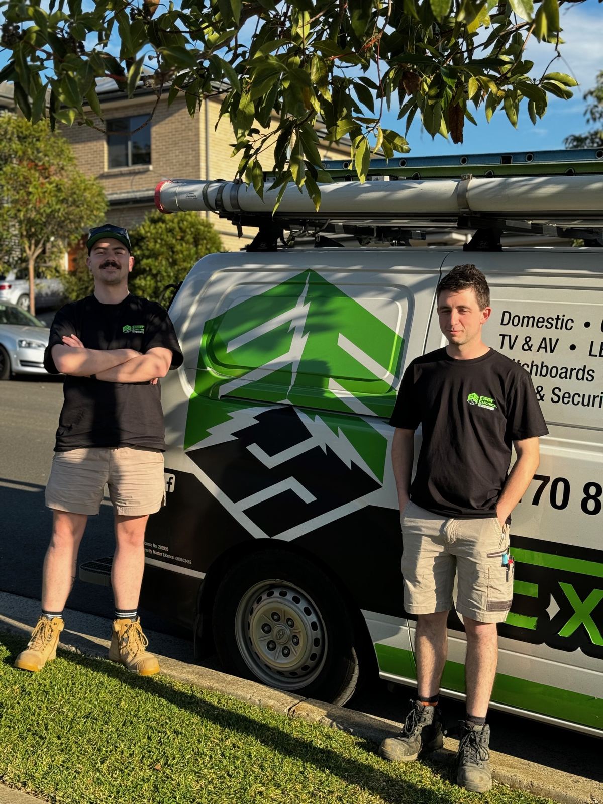 The Expert Electrical Services team with the van