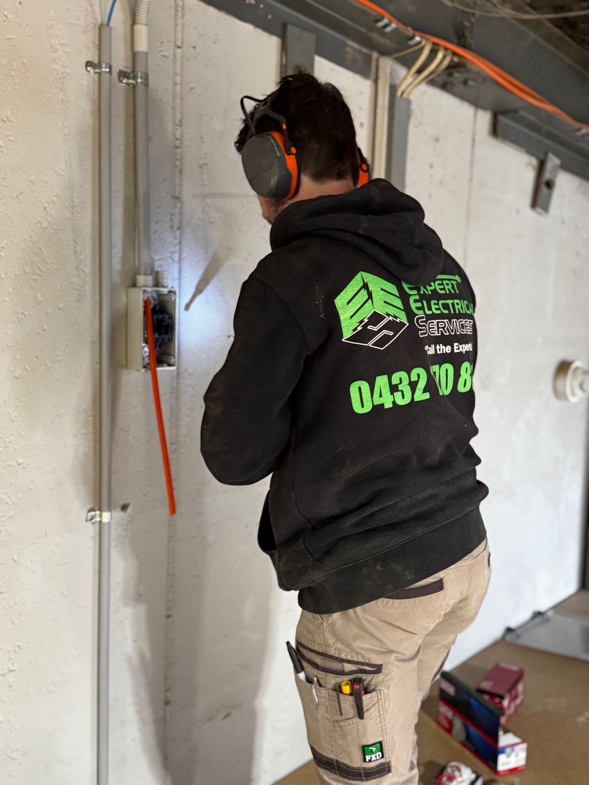 Expert Electrical Services electrician rewiring a home