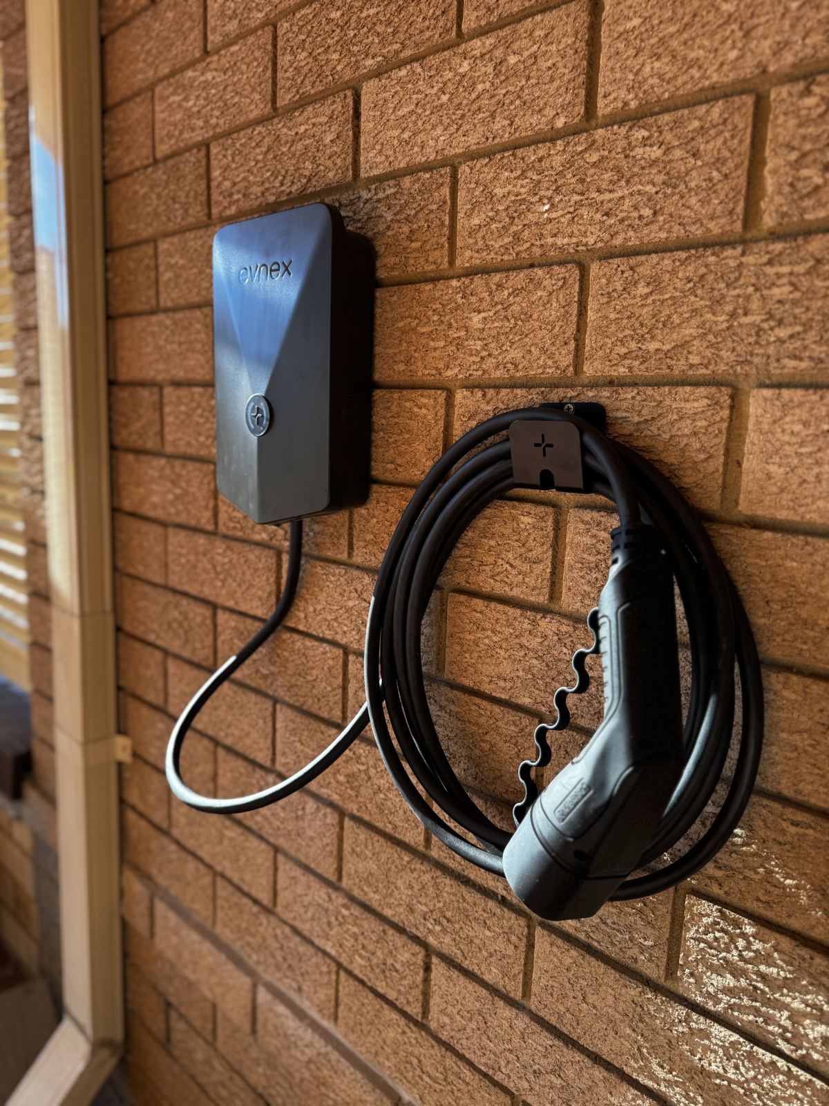 Evnex EV charger with cable holster