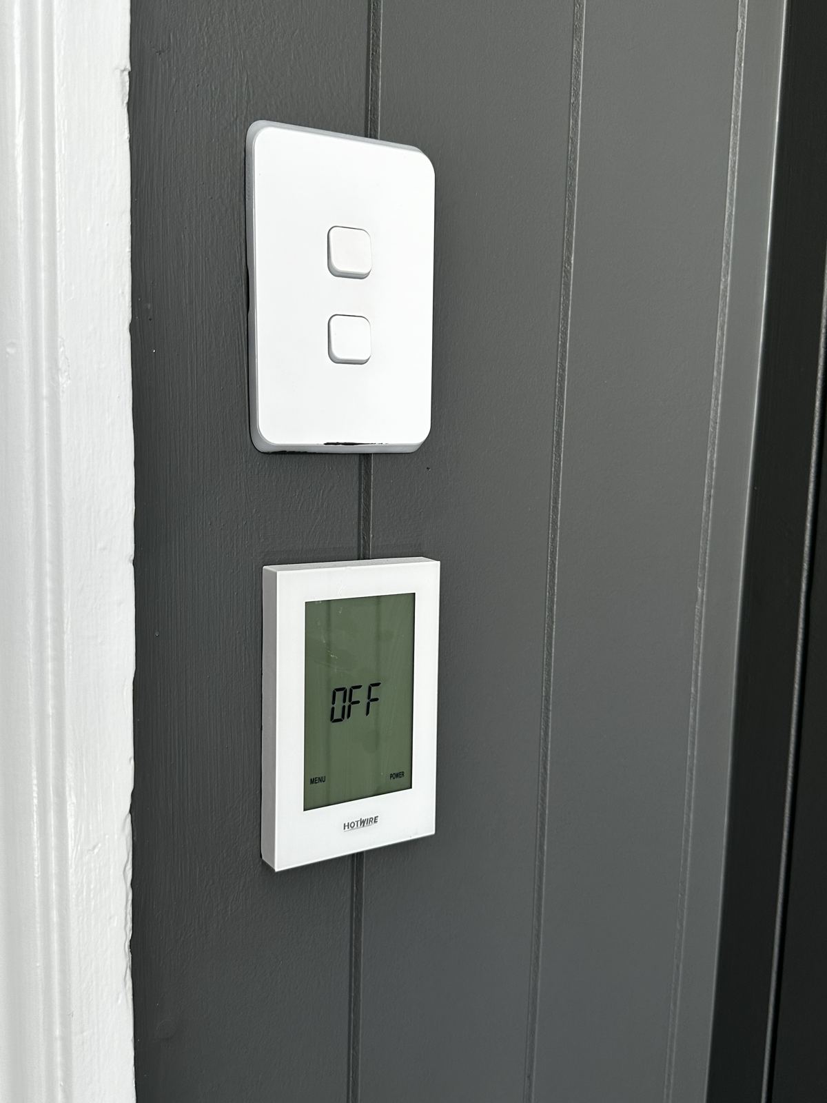 Light switch and heated floor controller installed in a Western Sydney home