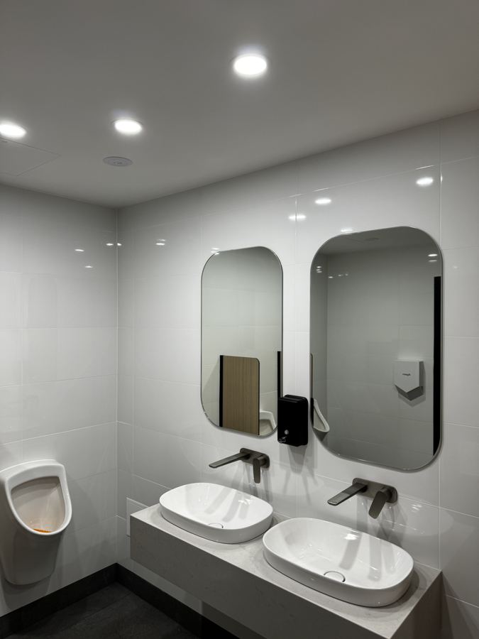 Commercial bathroom fit-out with downlights